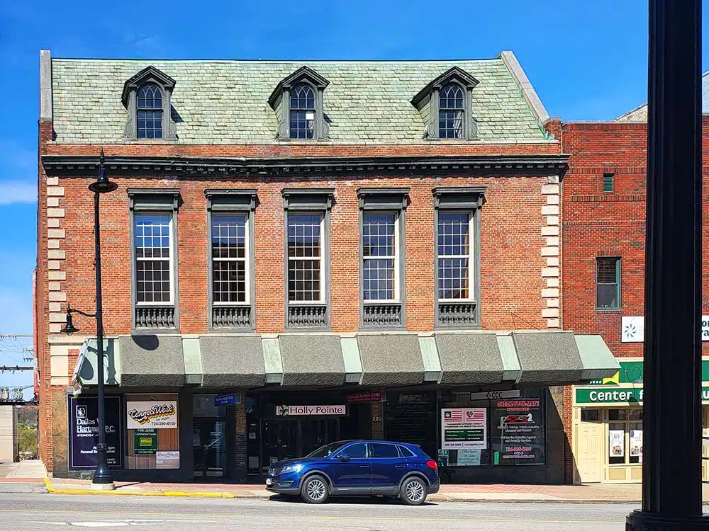 Street view of brick building housing Crossroads clinic