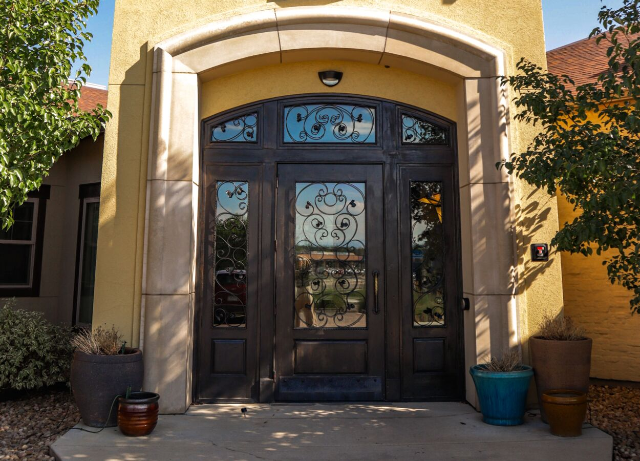 Main entrance with decorative glass doors at Foundry Front Range