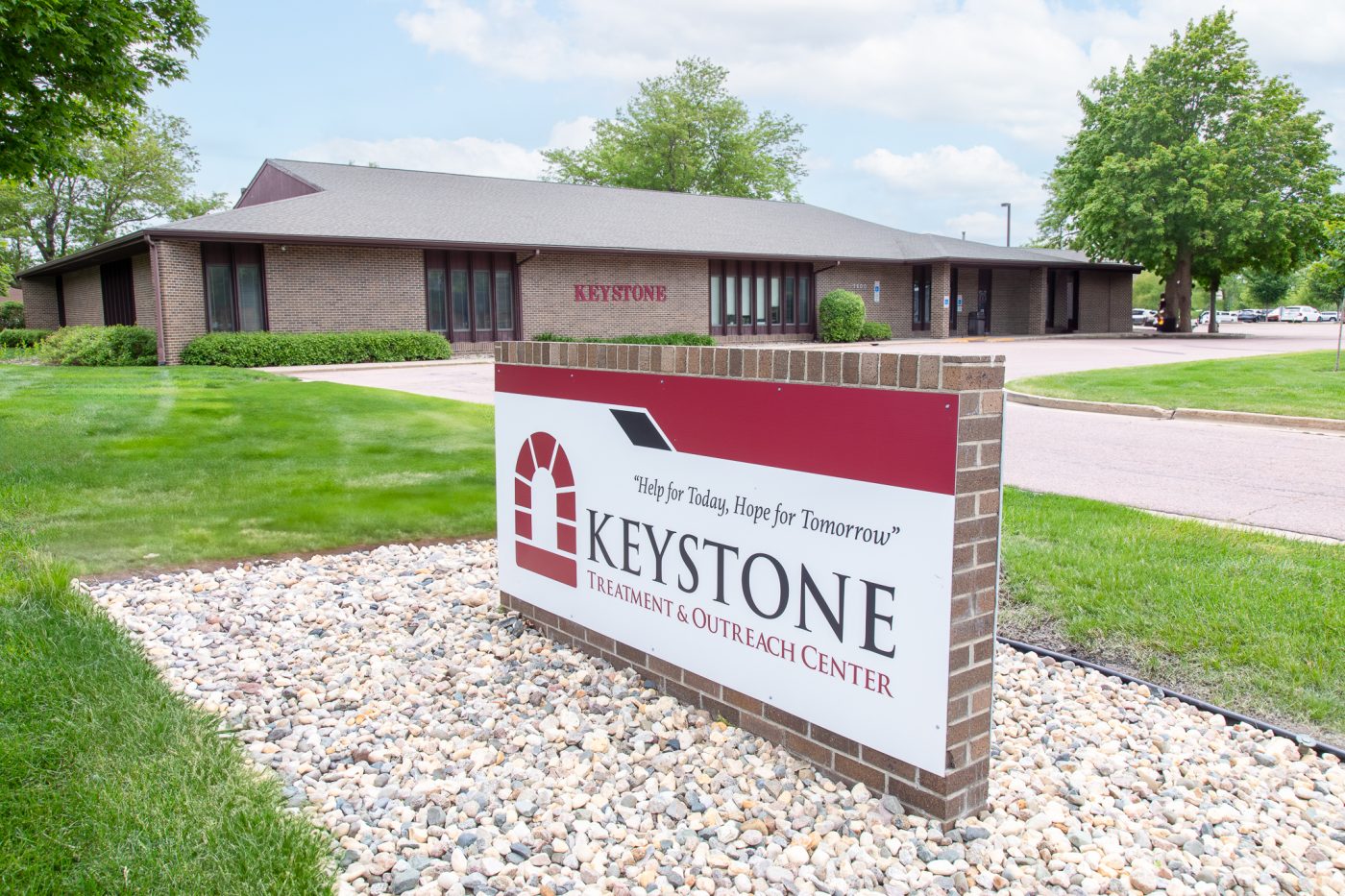 Keystone Treatment and Outreach Center sign displayed outside treatment facility building with landscaped grounds