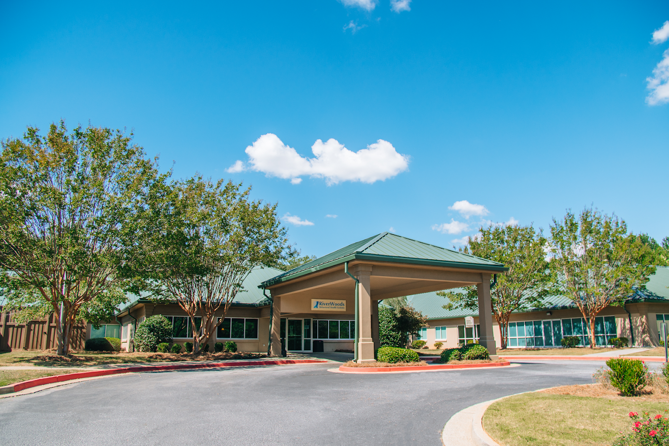 Exterior entrance of Riverwoods Behavioral Health System