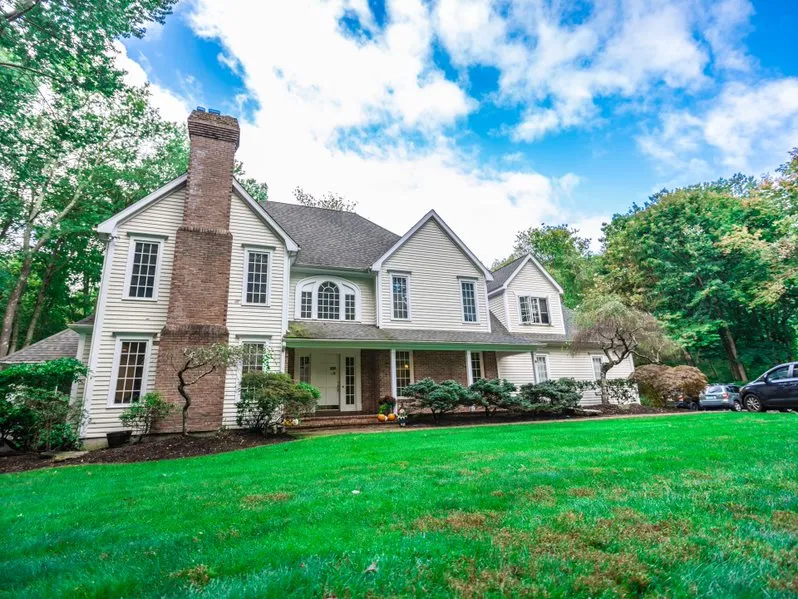 Residential treatment home with landscaped front lawn
