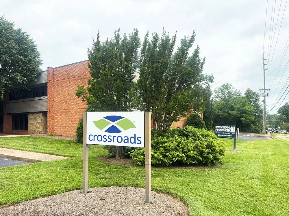 Crossroads treatment center exterior with signage and lawn