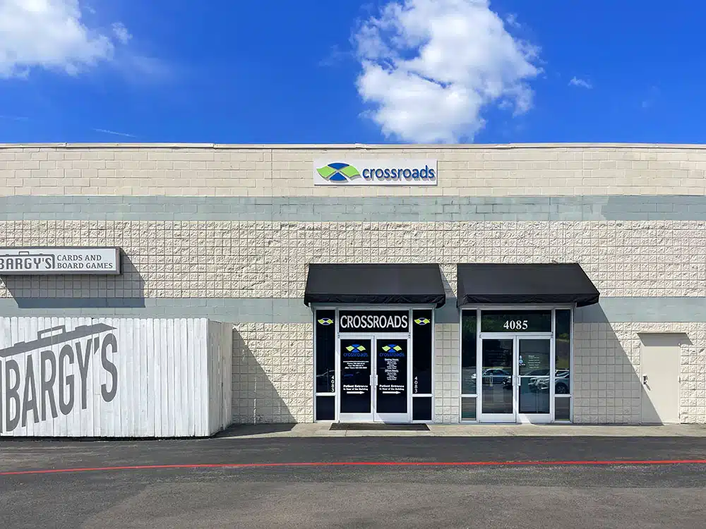 Front entrance of Crossroads clinic in a strip mall