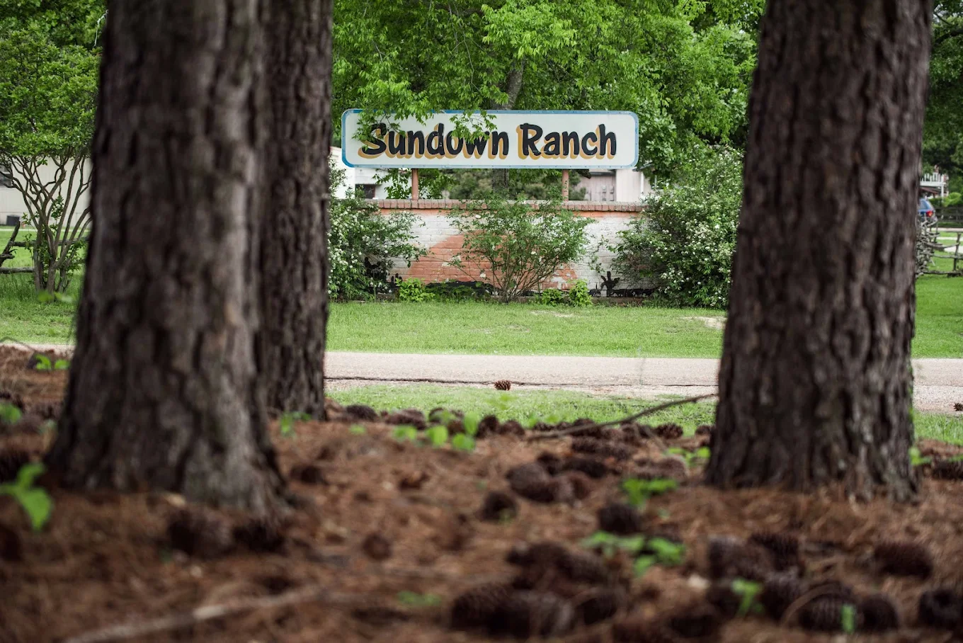 Sundown Ranch sign displayed near campus entrance