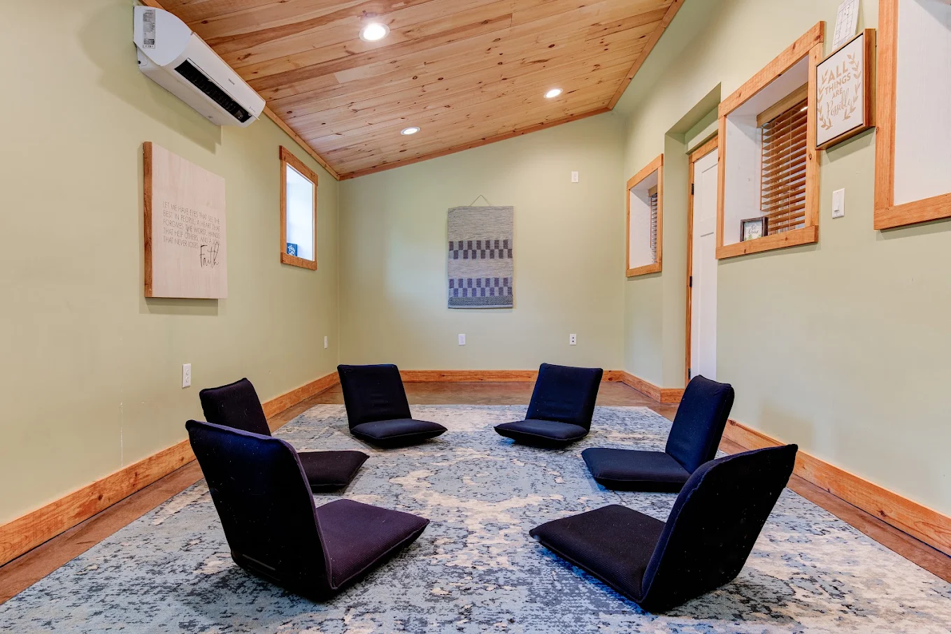 Group meeting area with floor chairs arranged in a circle