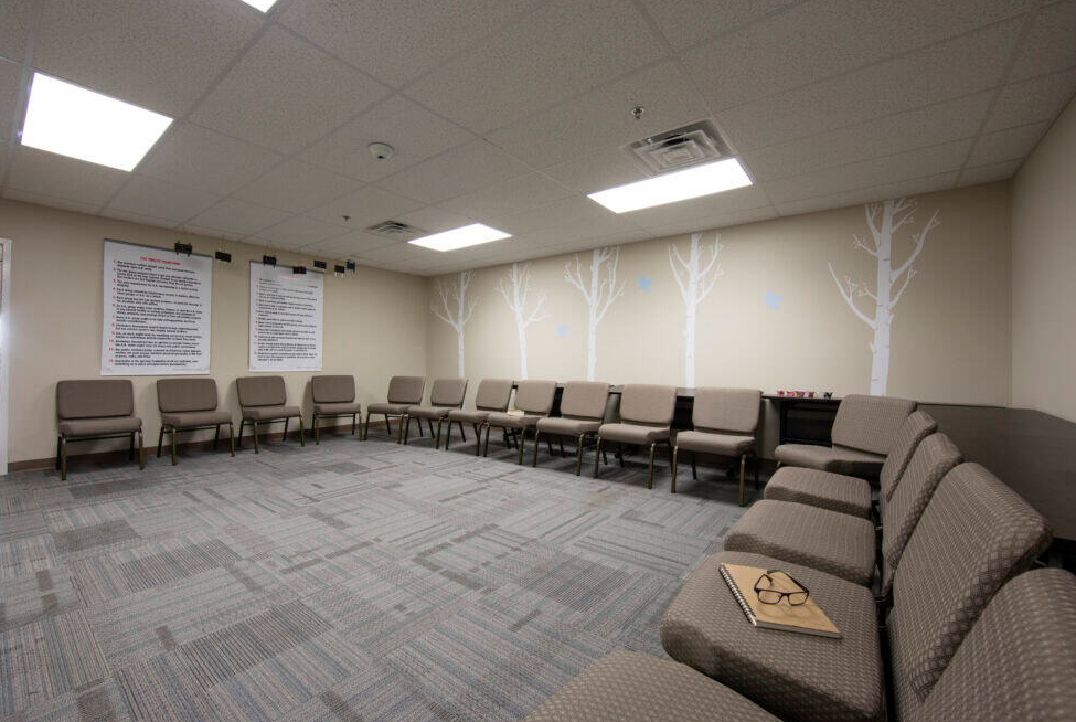 Group therapy room with chairs arranged in a circle