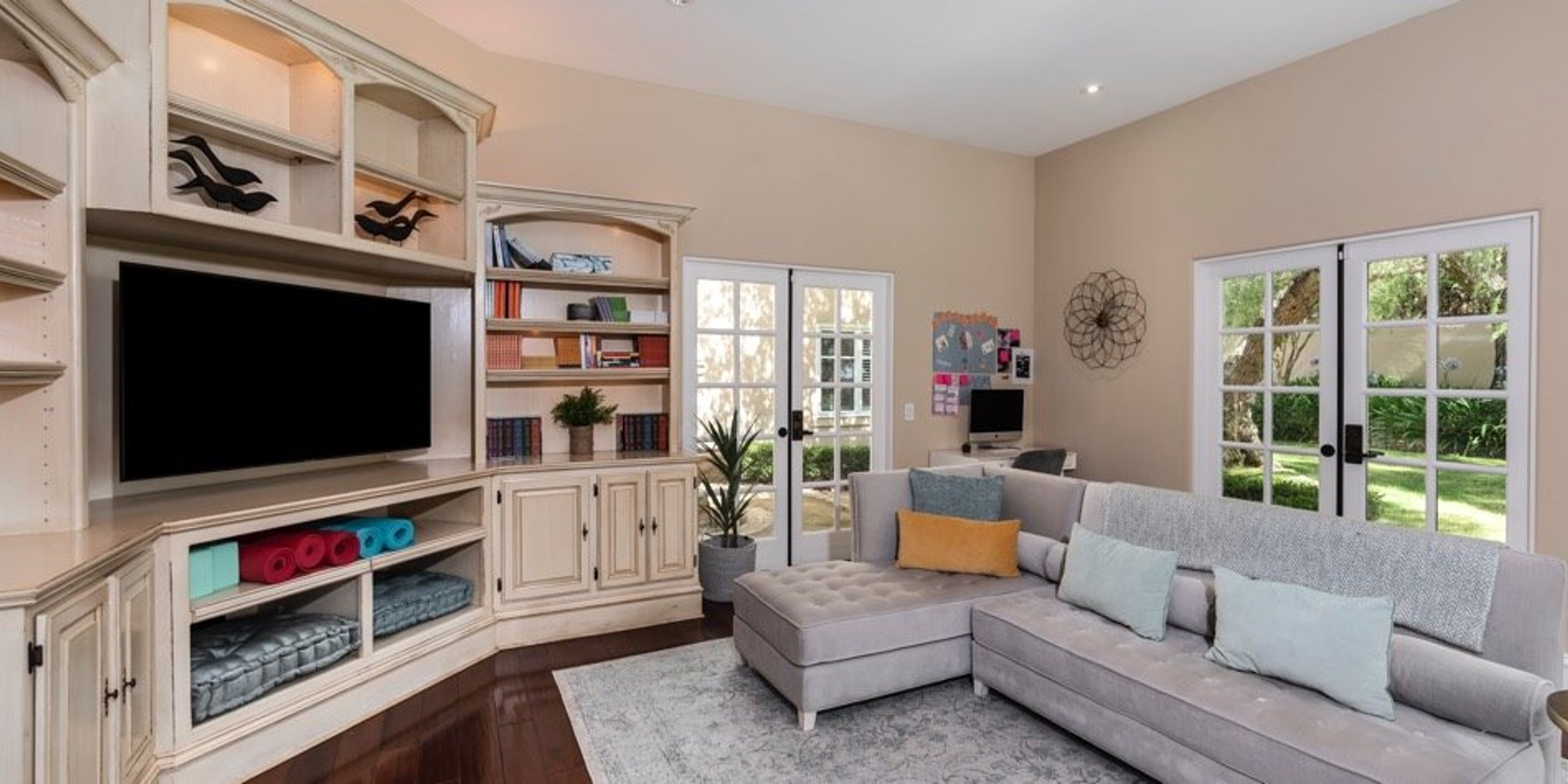 Cozy living room with sectional sofa and built-in shelving