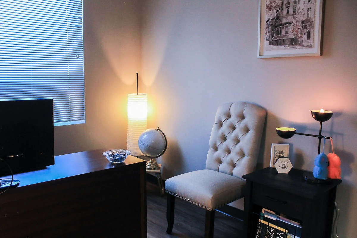 Private counseling room with soft lighting and comfortable seating