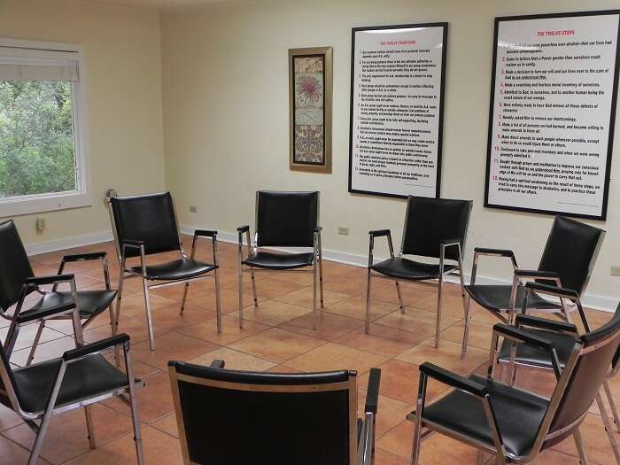 Circle of chairs in 12-step meeting room