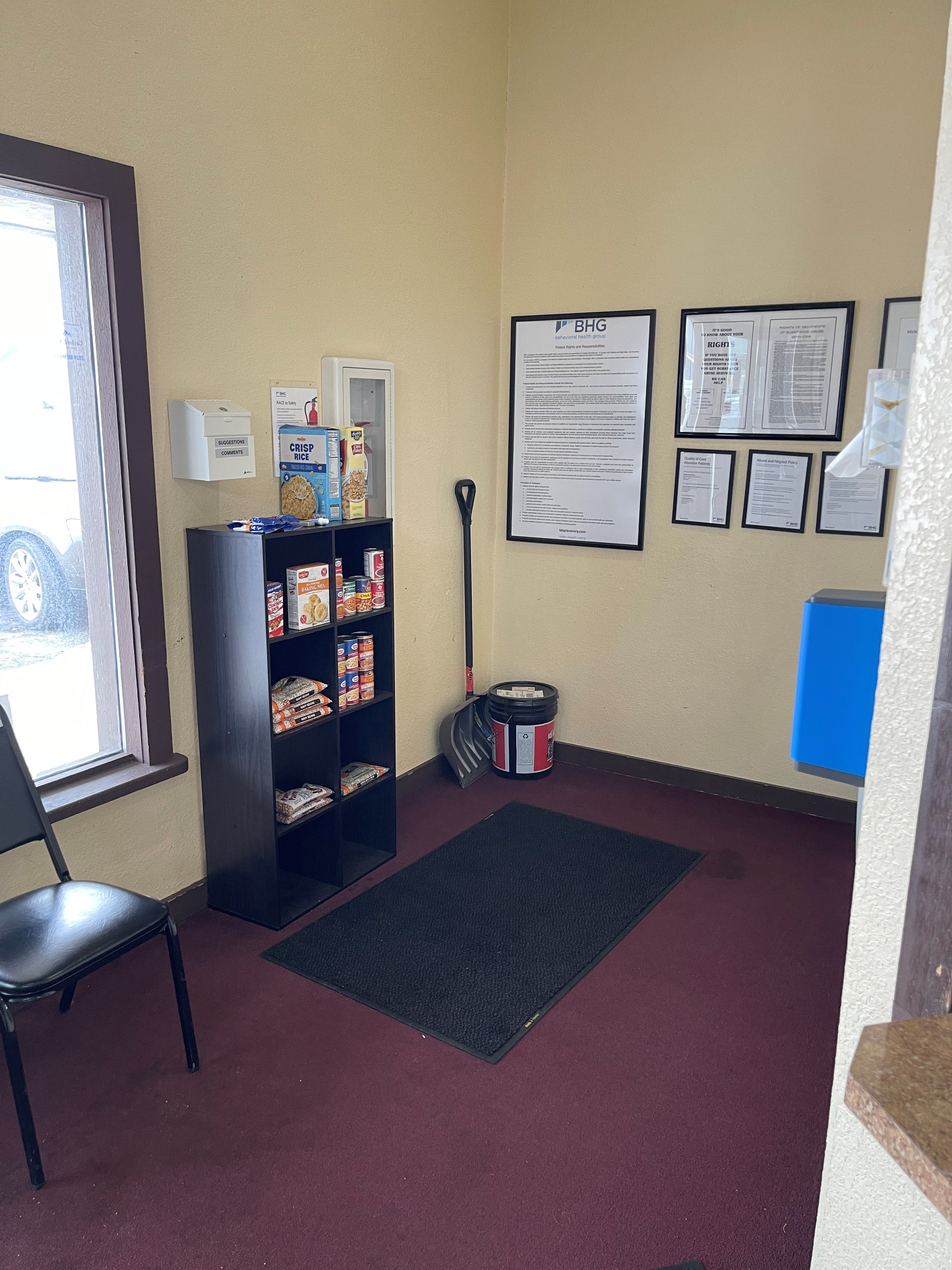 Patient resource area with informational posters and supplies