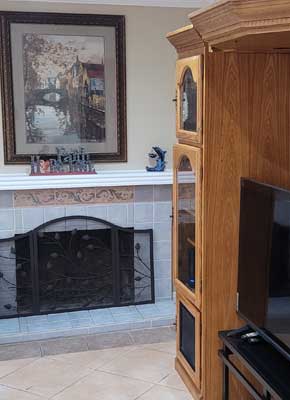 Living room with fireplace and wooden furniture