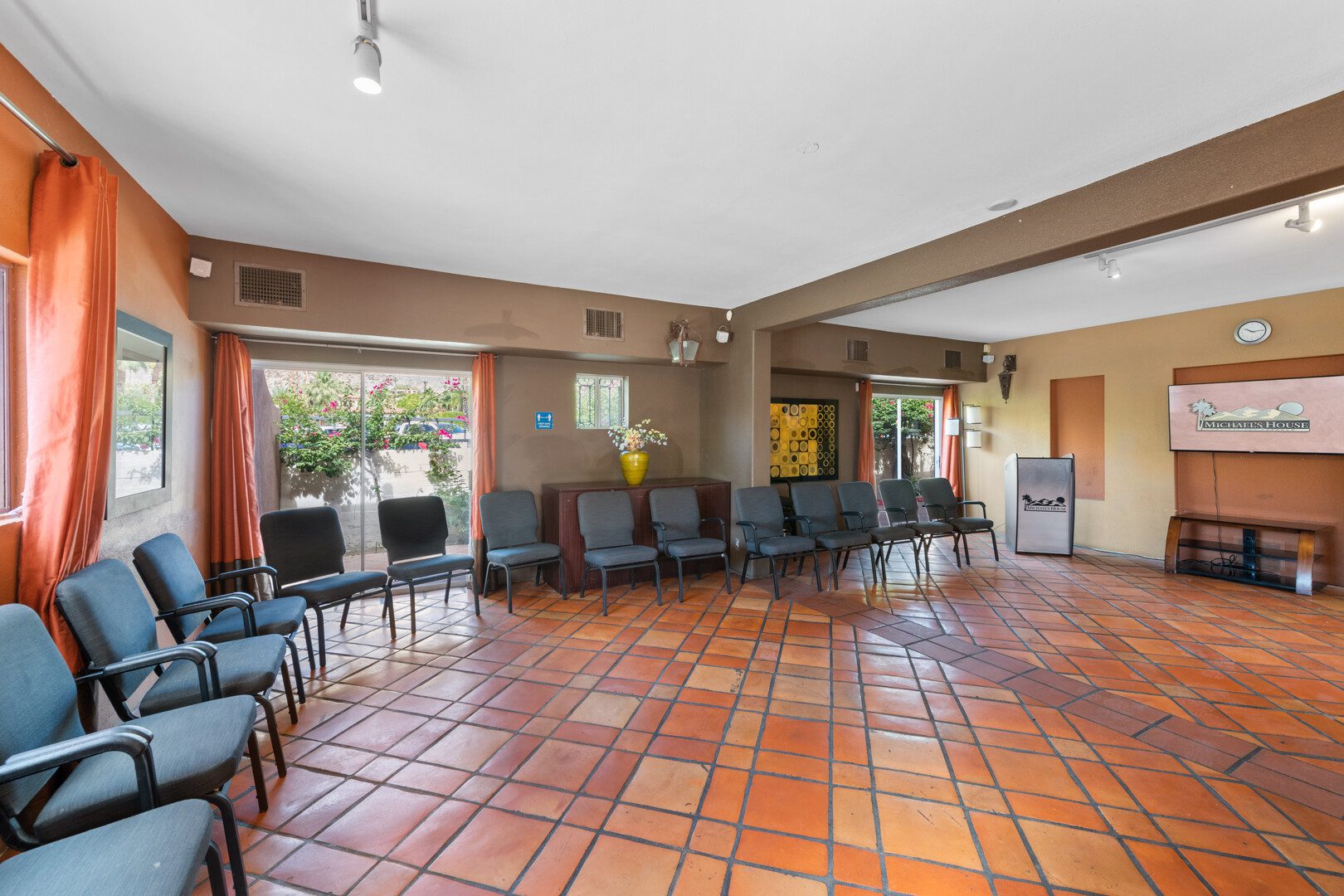 Group therapy room with chairs arranged for meetings