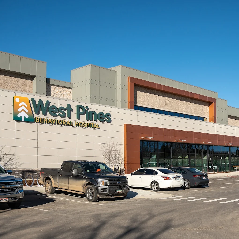 West Pines Behavioral Hospital exterior with parking area