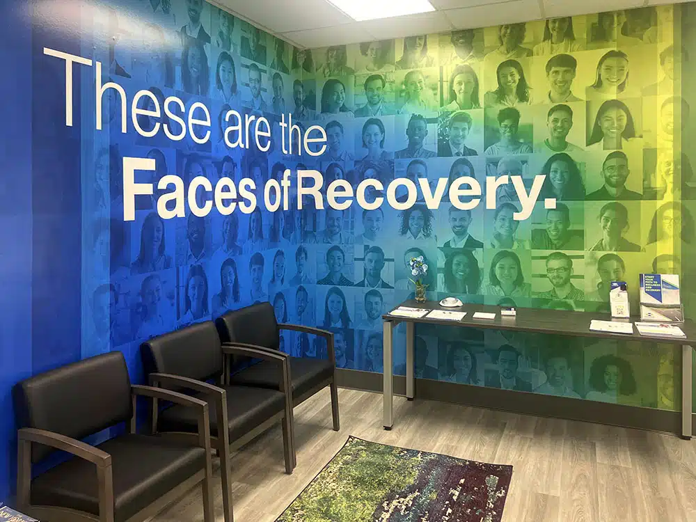 Waiting Room with Faces of Recovery Wall
