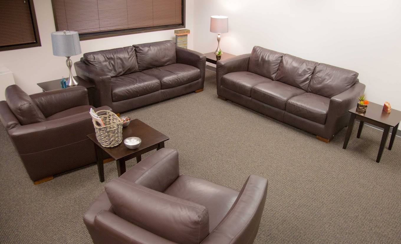 Rehab lounge with sofas and side tables