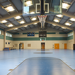 Indoor basketball court with polished floor
