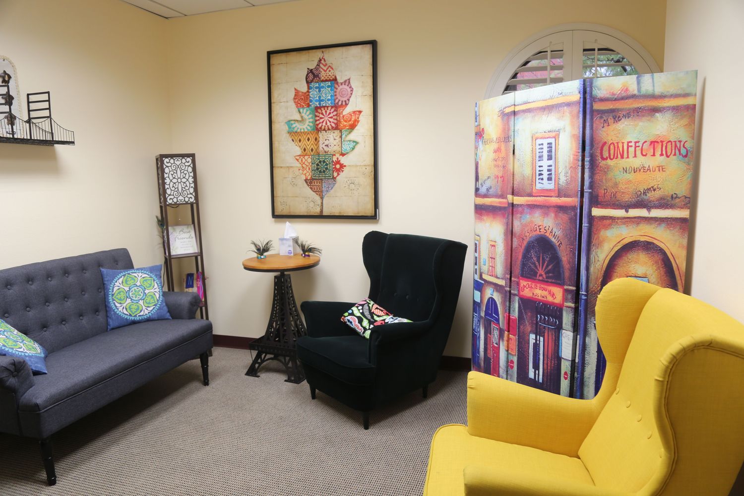 Two armchairs in private room with peaceful wall art