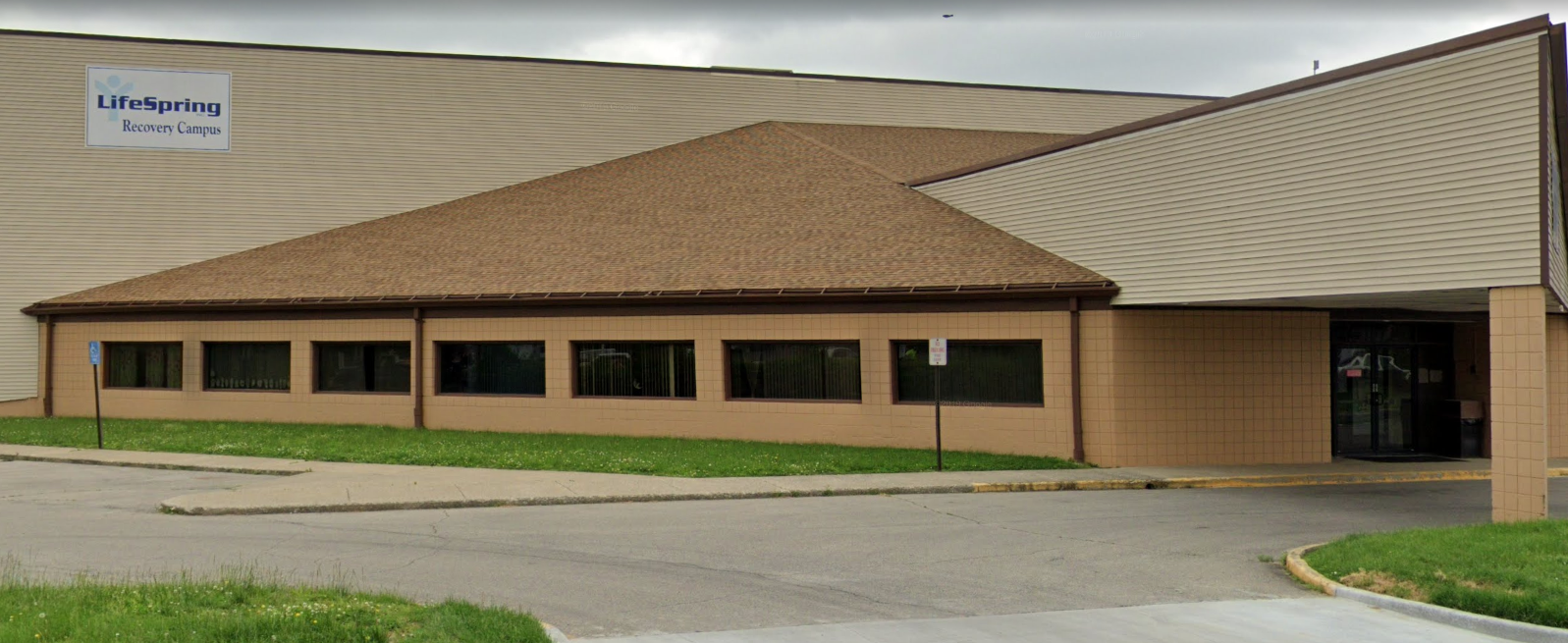 Building entrance with LifeSpring Recovery Campus sign