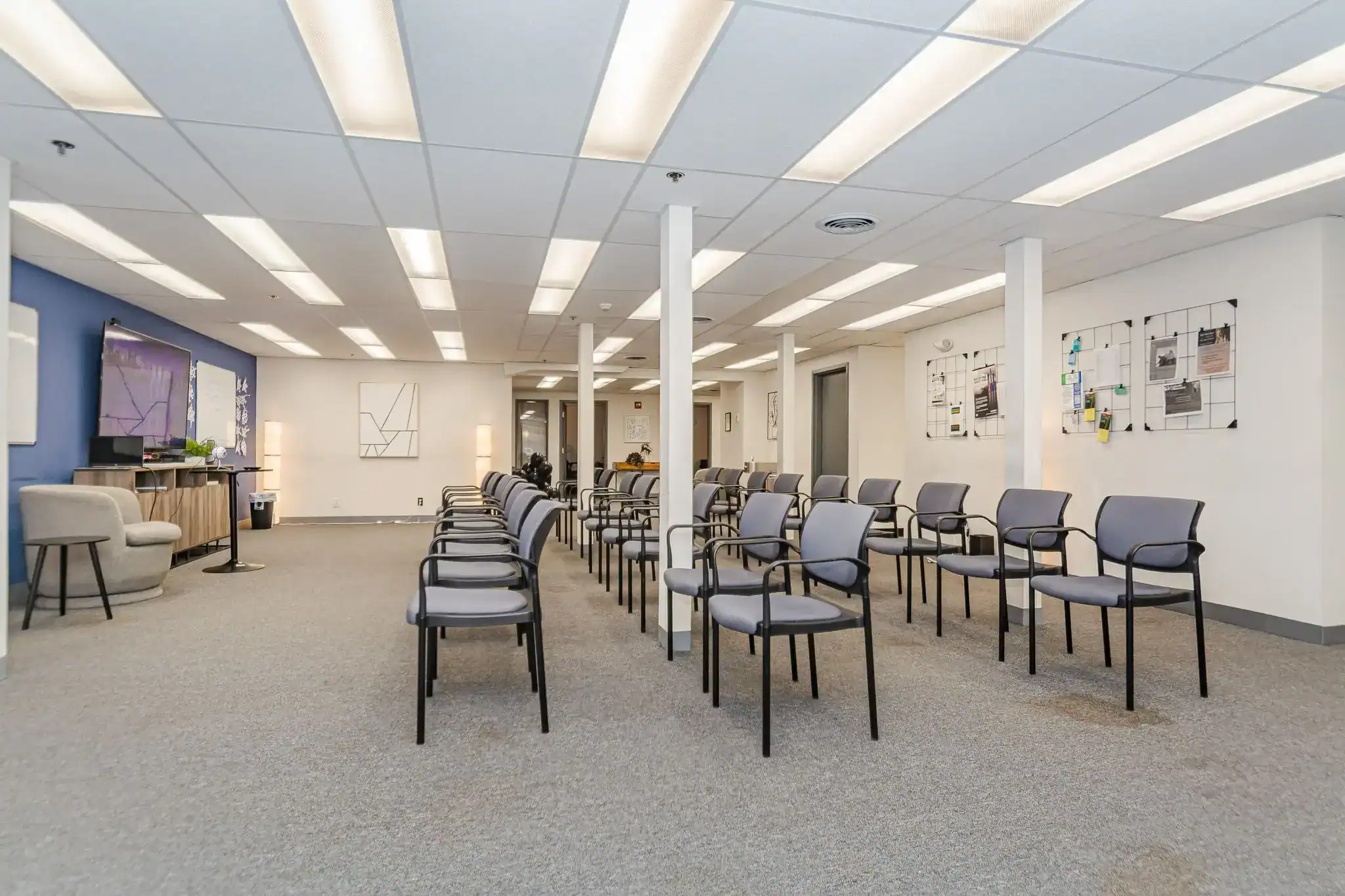 Group meeting room with rows of chairs