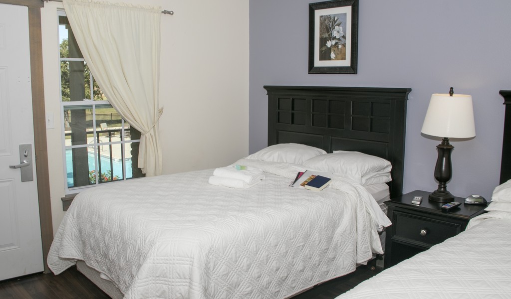 Shared bedroom with two beds.