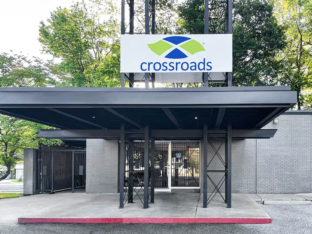 Crossroads treatment center entrance with covered drop-off area