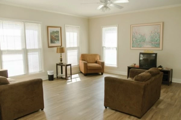 Community lounge with sofas, chairs, and television