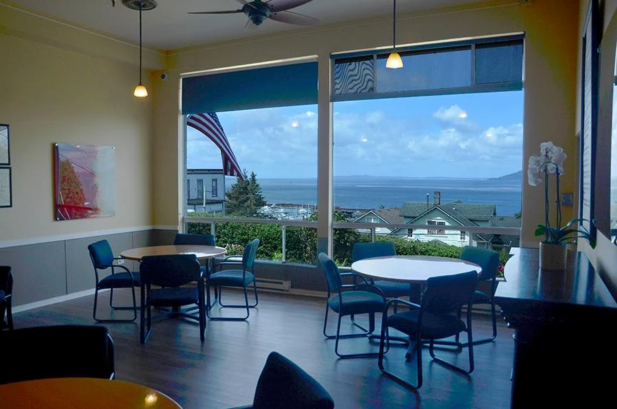 Lounge with ocean view through large picture windows