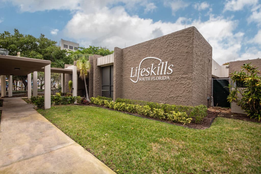 Modern rehab center exterior with Lifeskills South Florida sign