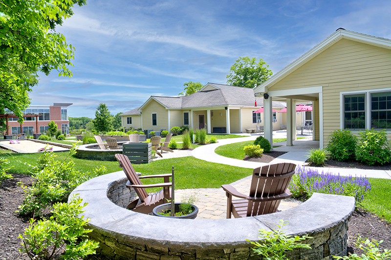Courtyard with seating, walkways, and landscaped gardens