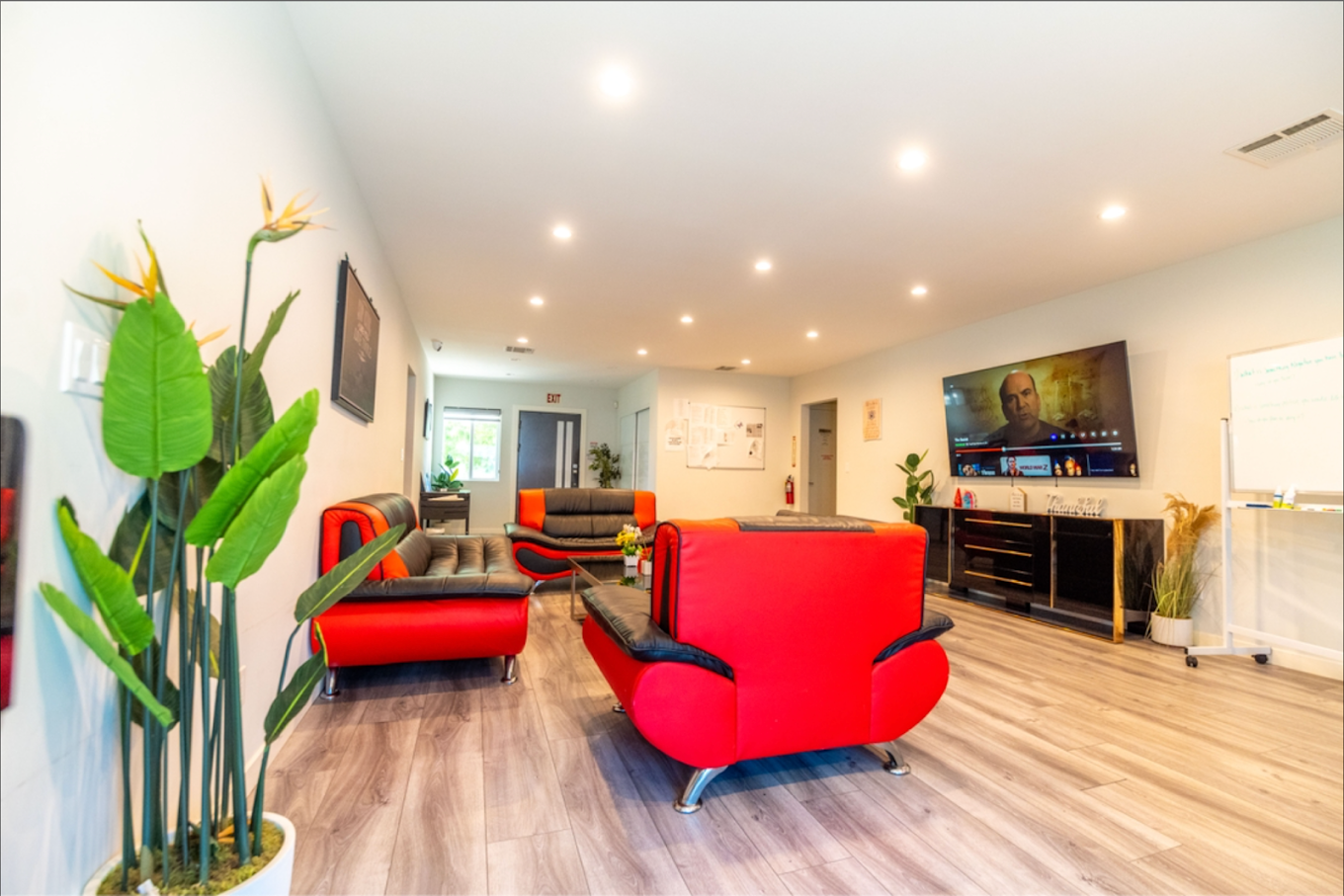Living room with couches and flat-screen TV