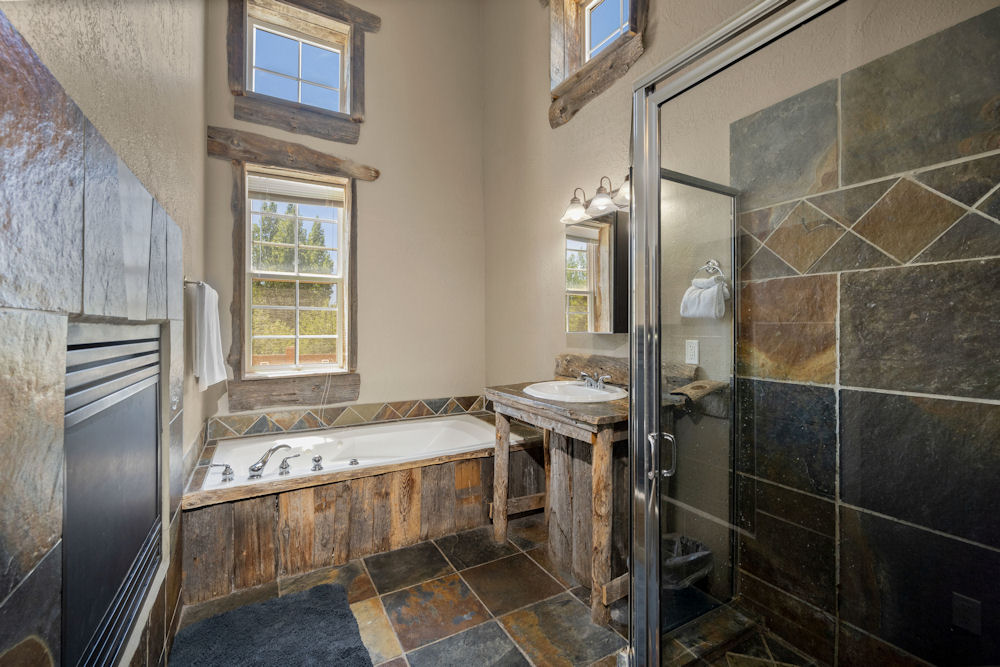 Bathroom with a tub and vanity.