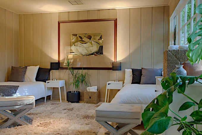 Shared bedroom with twin beds and cozy furnishings