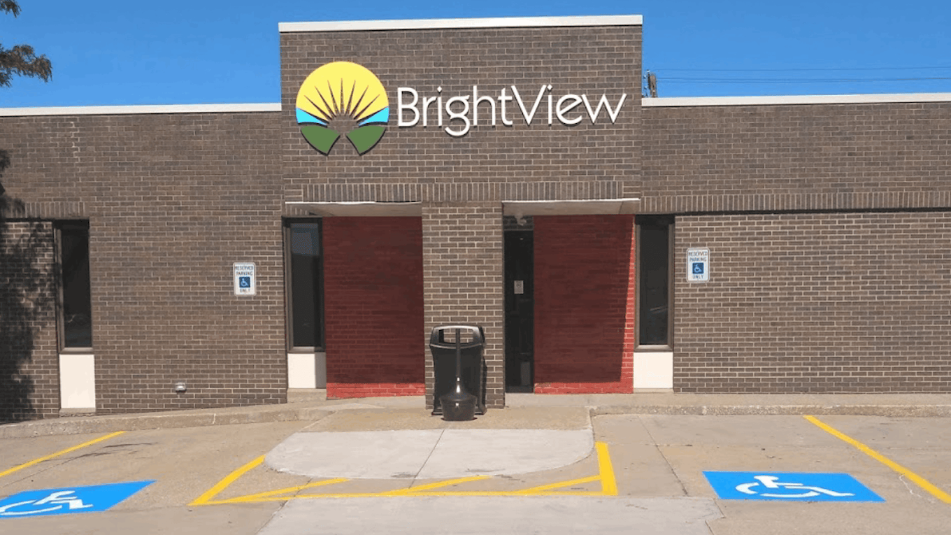 BrightView Akron addiction treatment center exterior with brick facade, BrightView signage, entrance, and accessible parking spaces