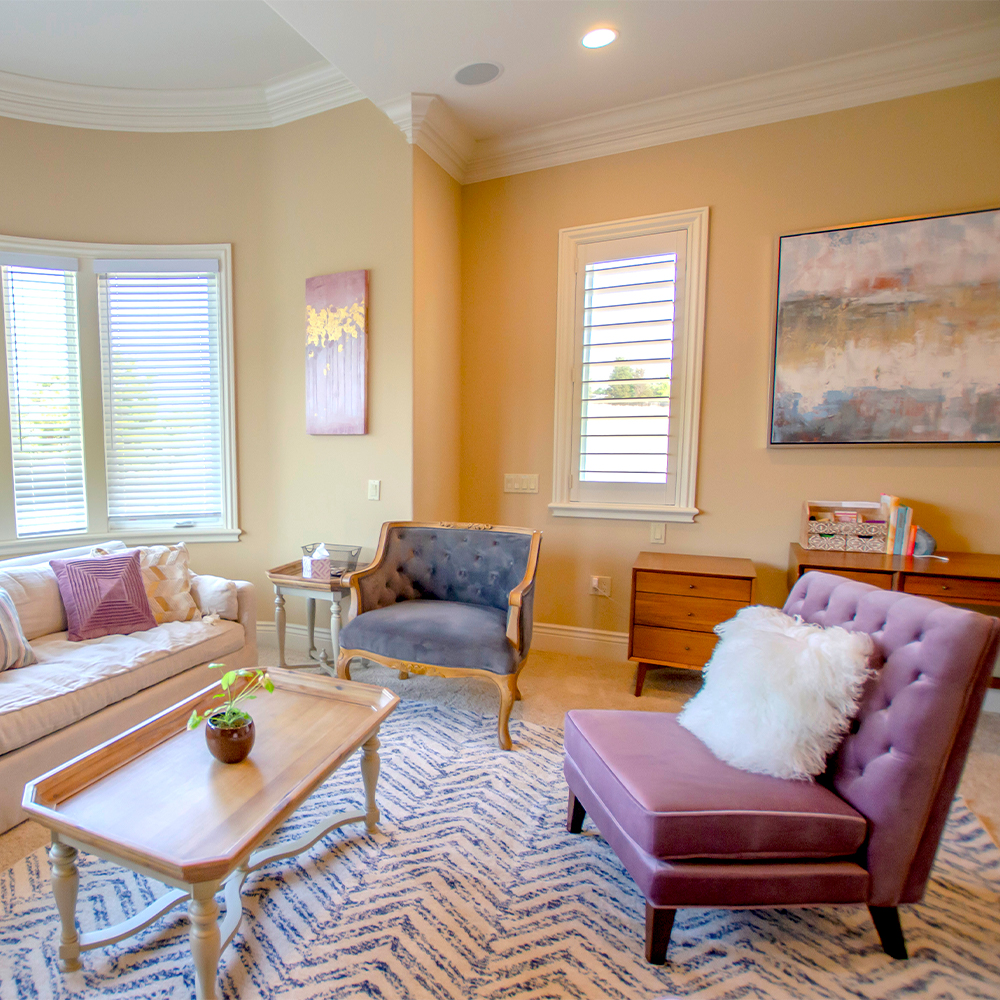 Lounge area with chairs and a table.