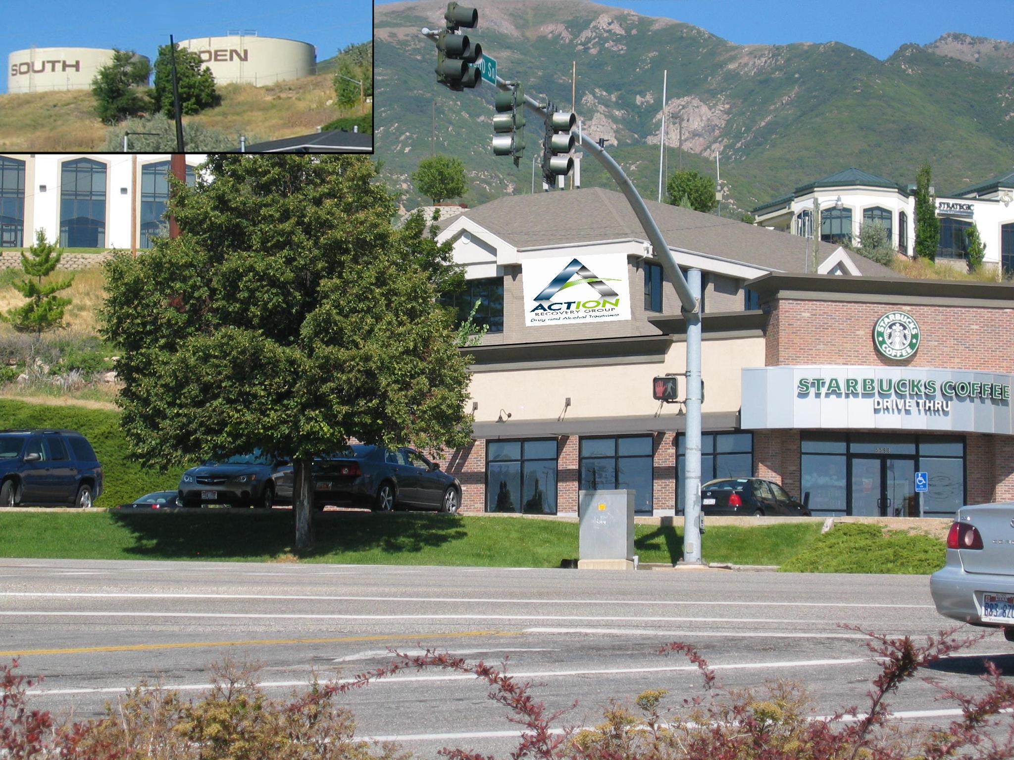 Exterior view of Action Recovery Group building in Ogden with Starbucks and nearby mountain backdrop