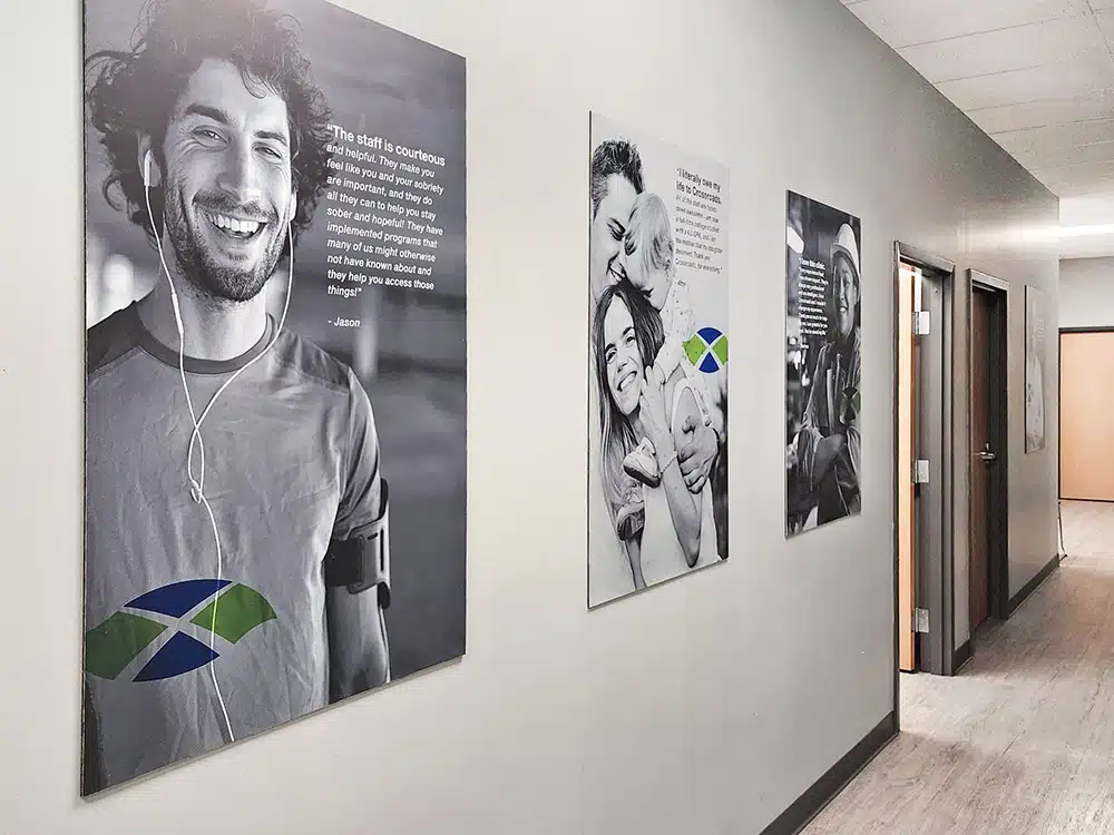 Hallway with recovery posters and consultation room doors