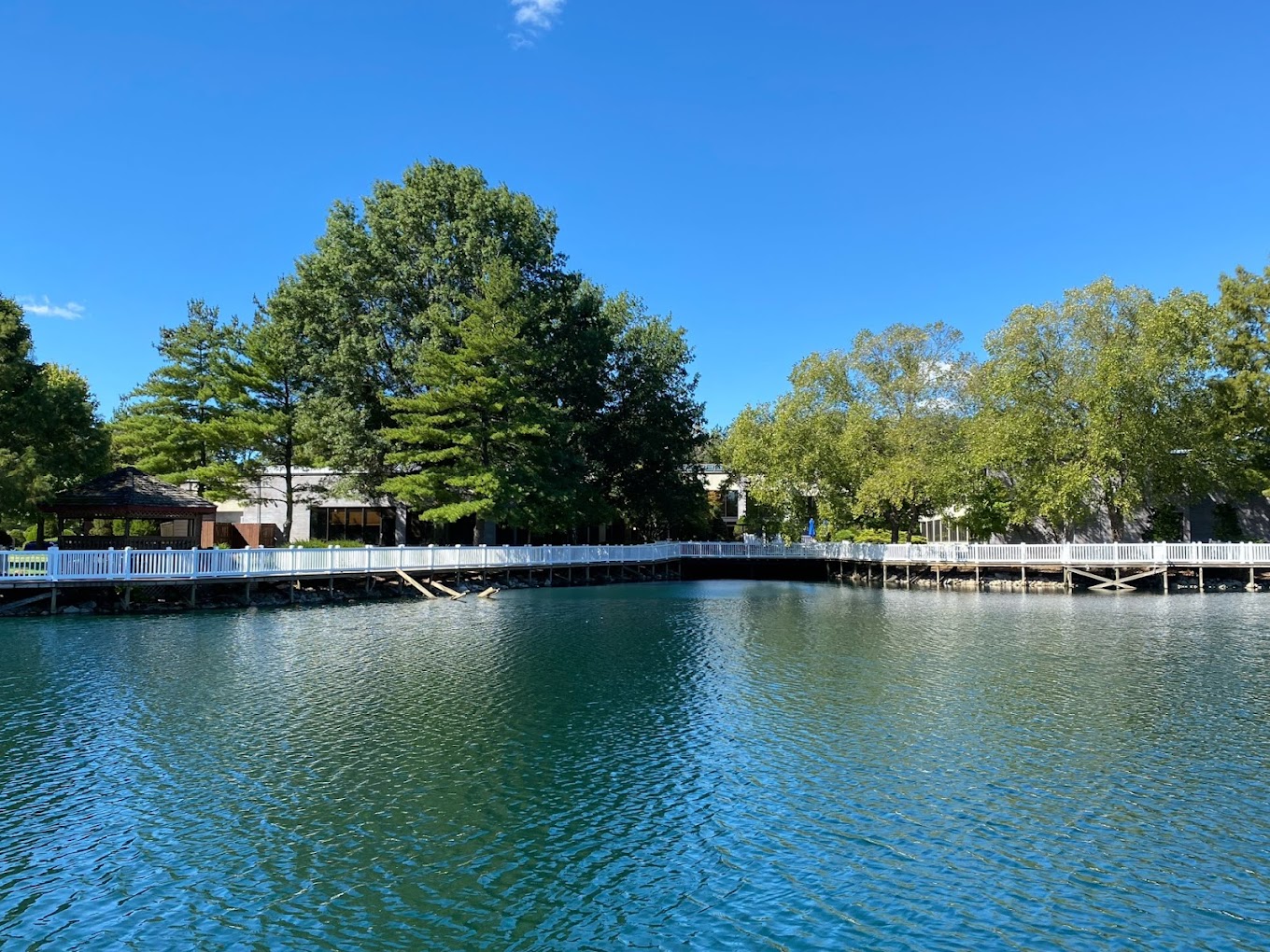 Lakeside view with a boardwalk and gazebo