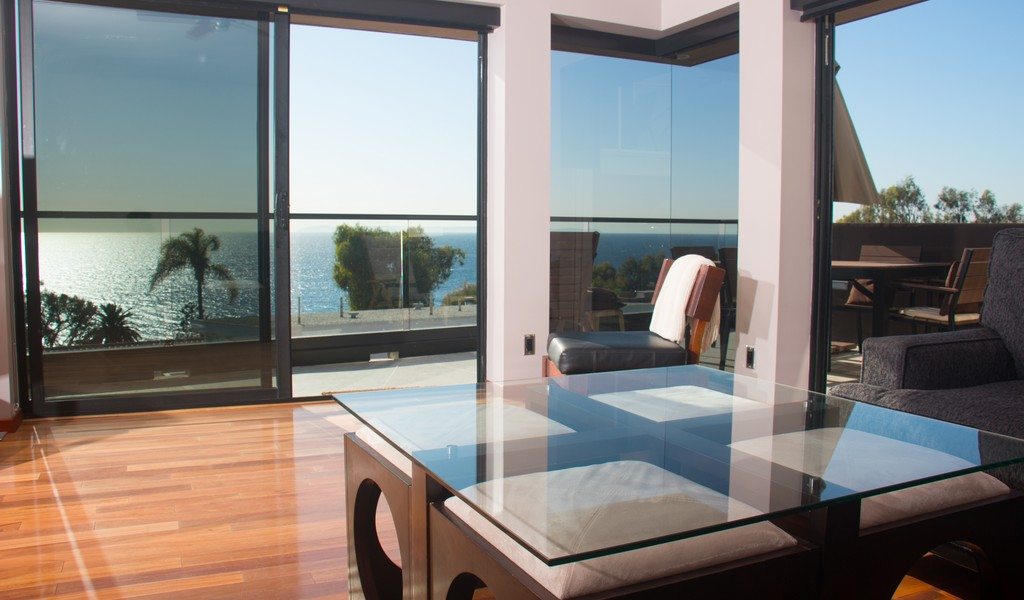 Lounge with glass windows overlooking the ocean