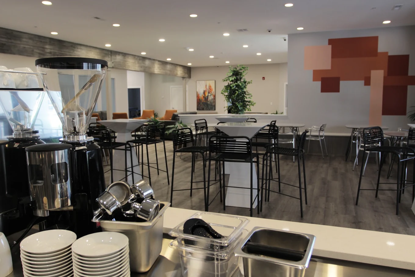 Kitchen beverage station and dining area for residents at Brighton House