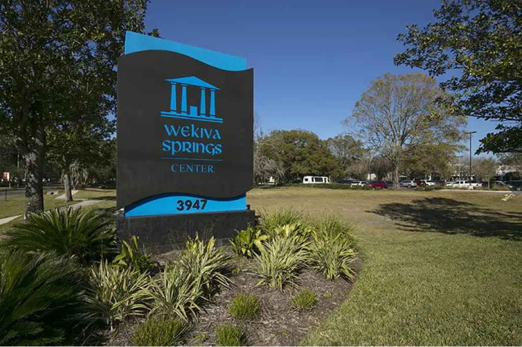 Wekiva Springs Center entrance sign with greenery
