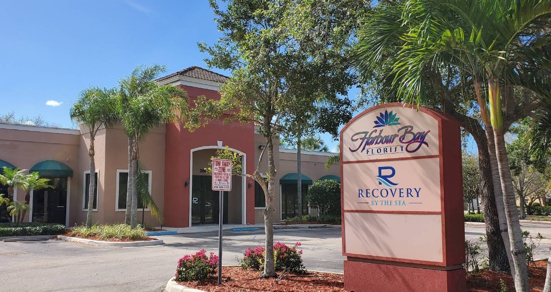 Recovery By The Sea facility exterior with entrance sign