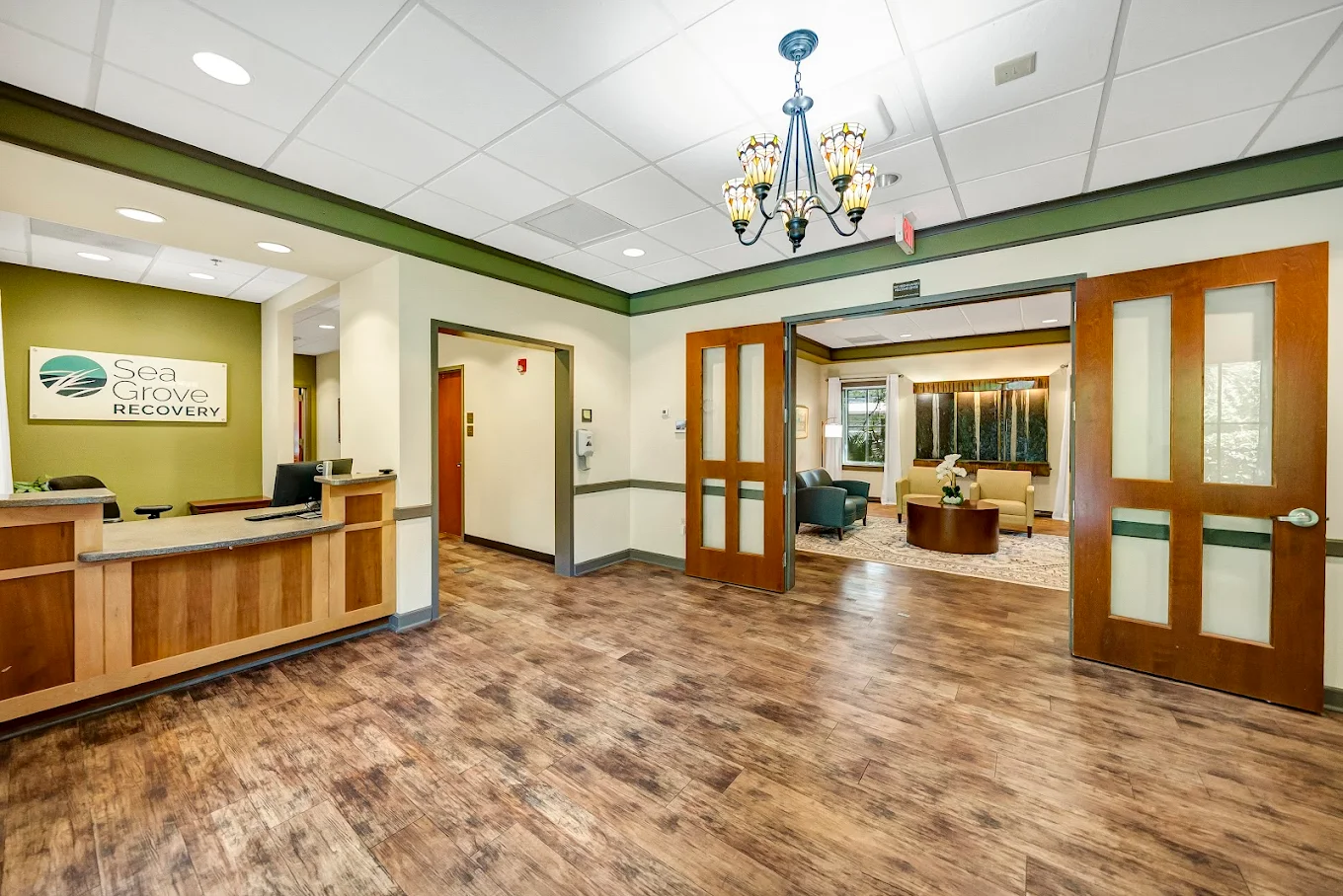 Reception desk and welcoming lobby at Sea Grove Recovery