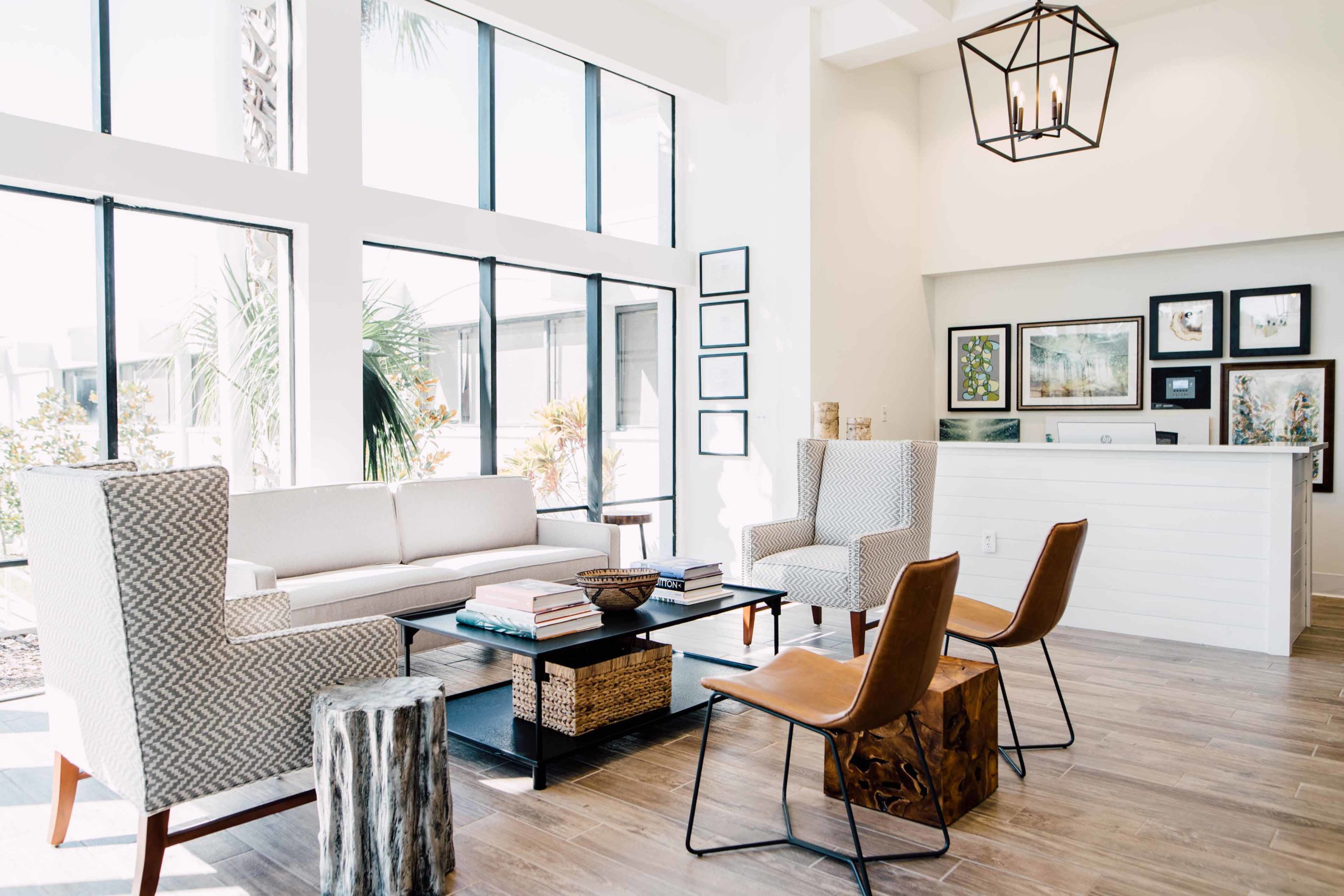 Bright lobby with seating area and framed artwork