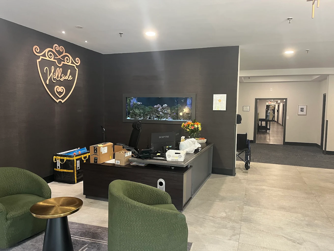 Facility lobby with reception desk and seating