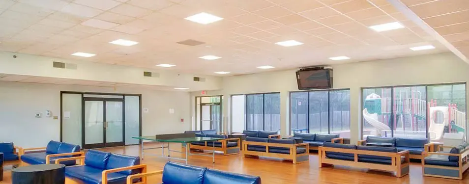Recreation lounge with seating and ping pong table