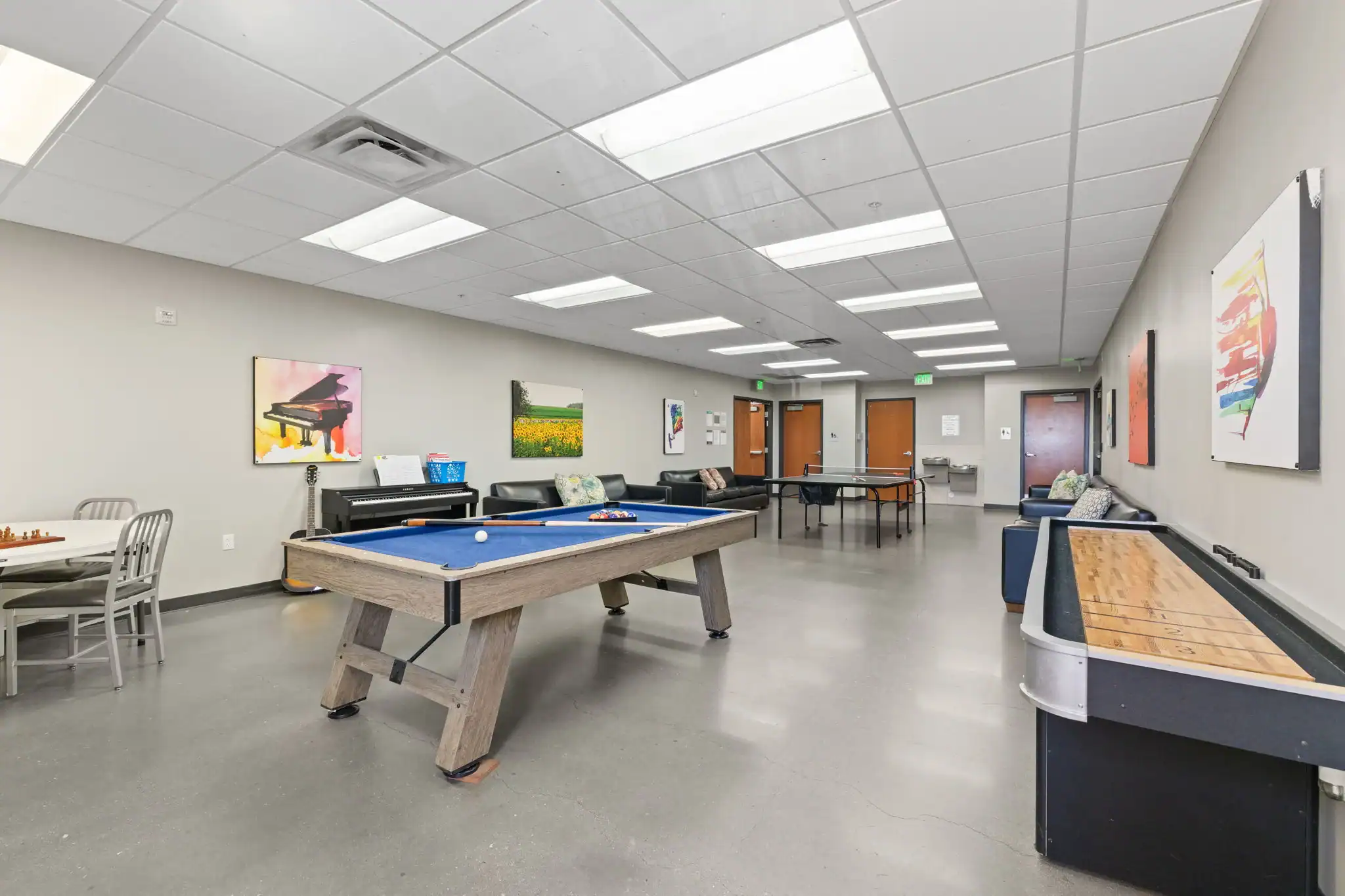 Recreation room with pool table and shuffleboard