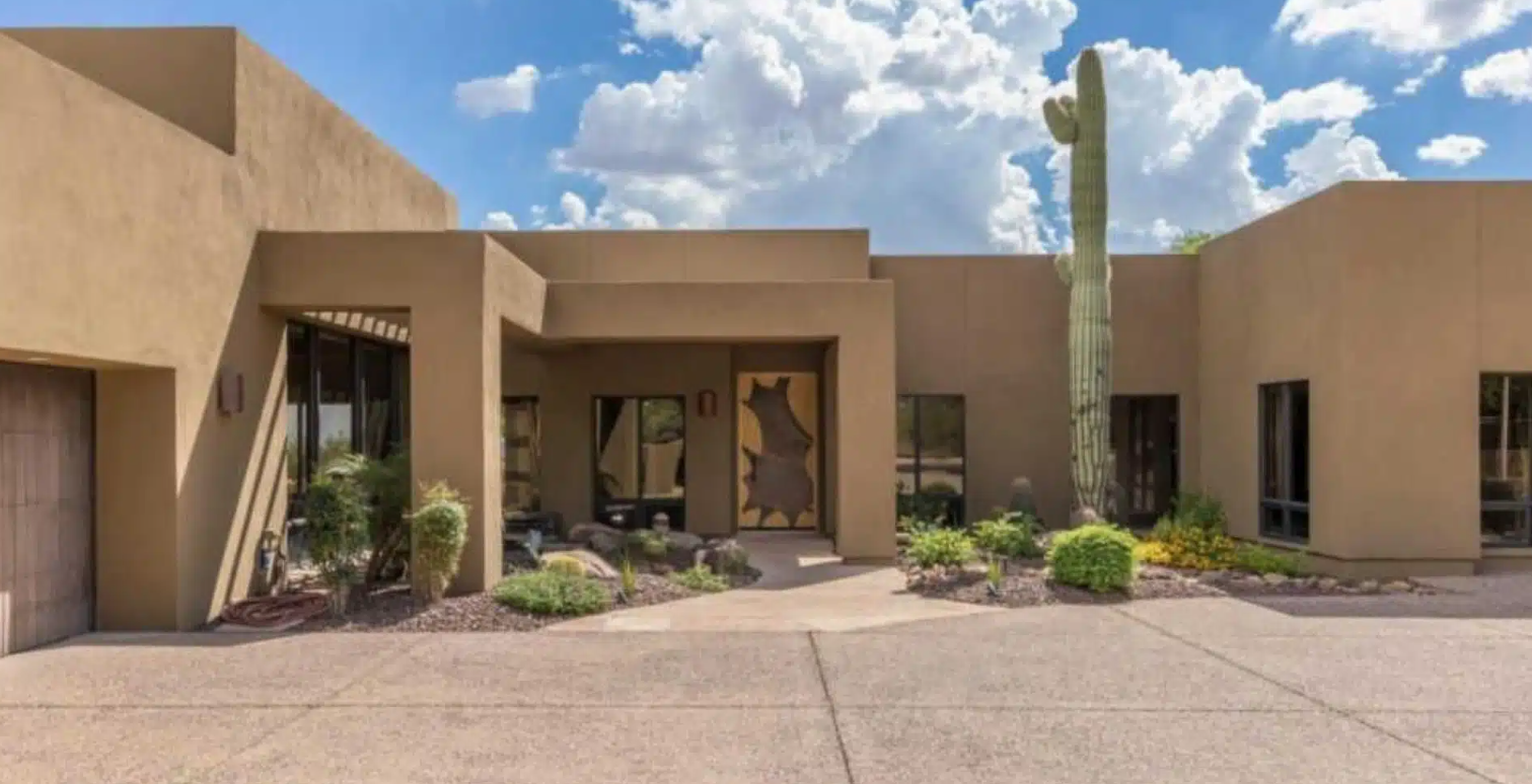 Modern adobe-style rehab center with desert landscaping