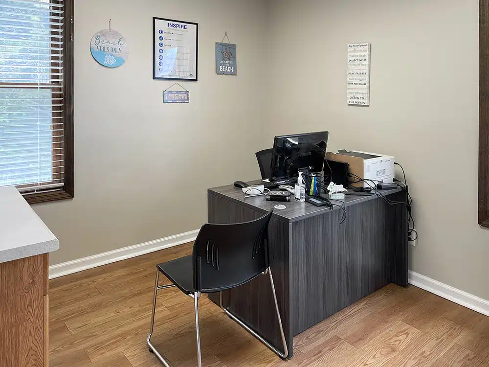 Office with desk, chair, and computer workstation