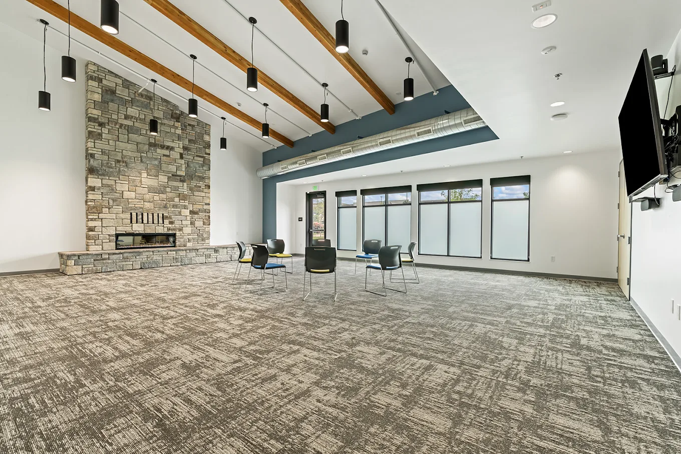 Recreation room with fireplace and seating area