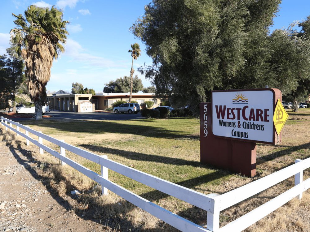 Facility exterior with sign reading  